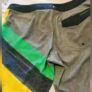 O'Neill Men's Jordy Freak Board Shorts   size 36 blue green yellow swim trunks